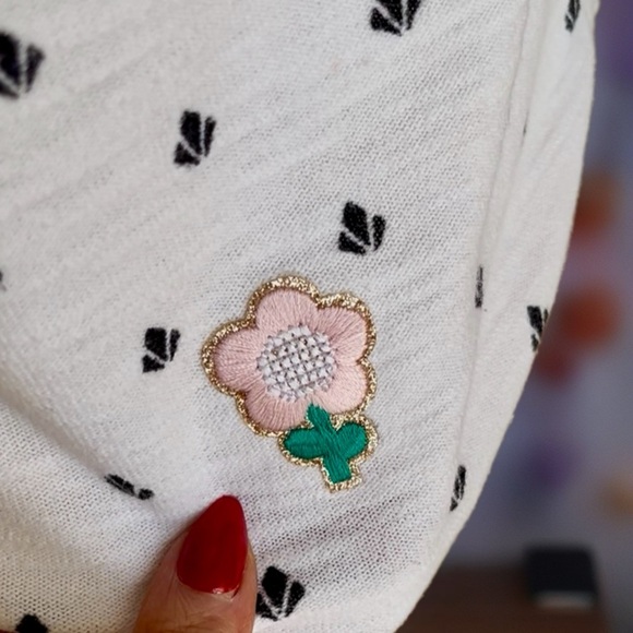 Elegant Black Patterned Women's Tee with Flower 🌺 Decal - Picture 4 of 10